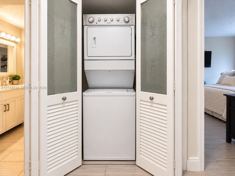 Stacked white laundry center.
