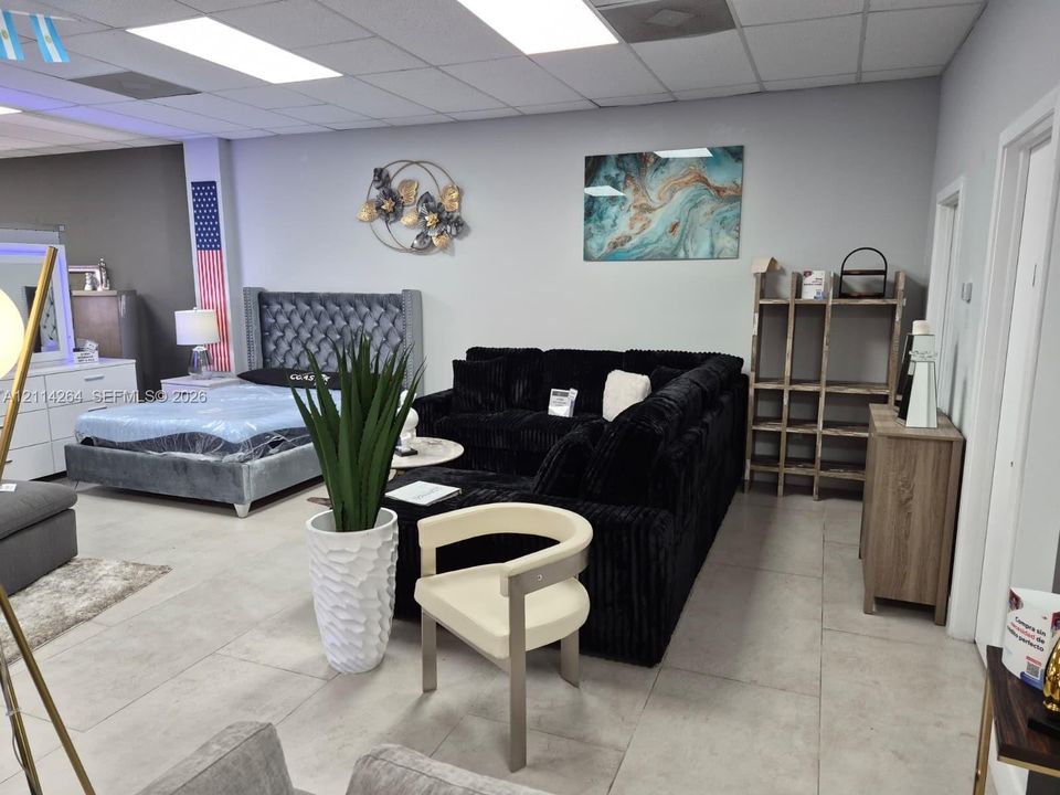 Large-format tile flooring and recessed drop-ceiling lighting