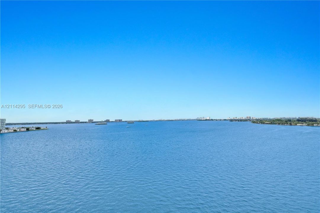 Expansive waterfront setting with an unobstructed horizon line and shoreline perimeter