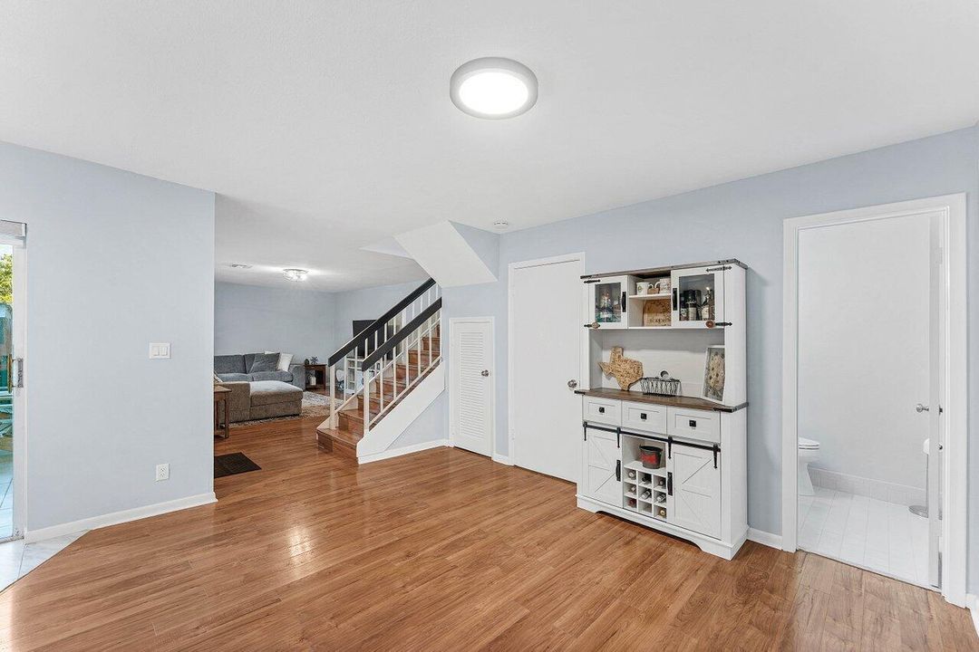 Dining with door to half bath