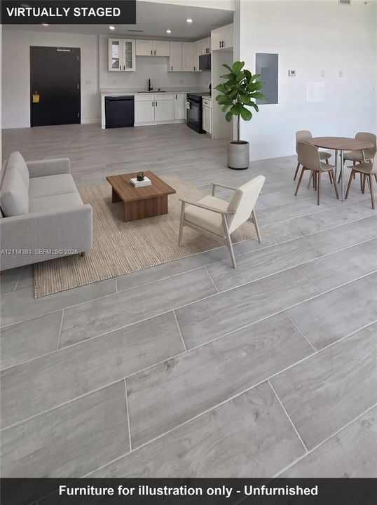 Kitchen featuring white shaker-style cabinetry, recessed ceiling lighting, and porcelain tile flooring with a wood-finish aesthetic