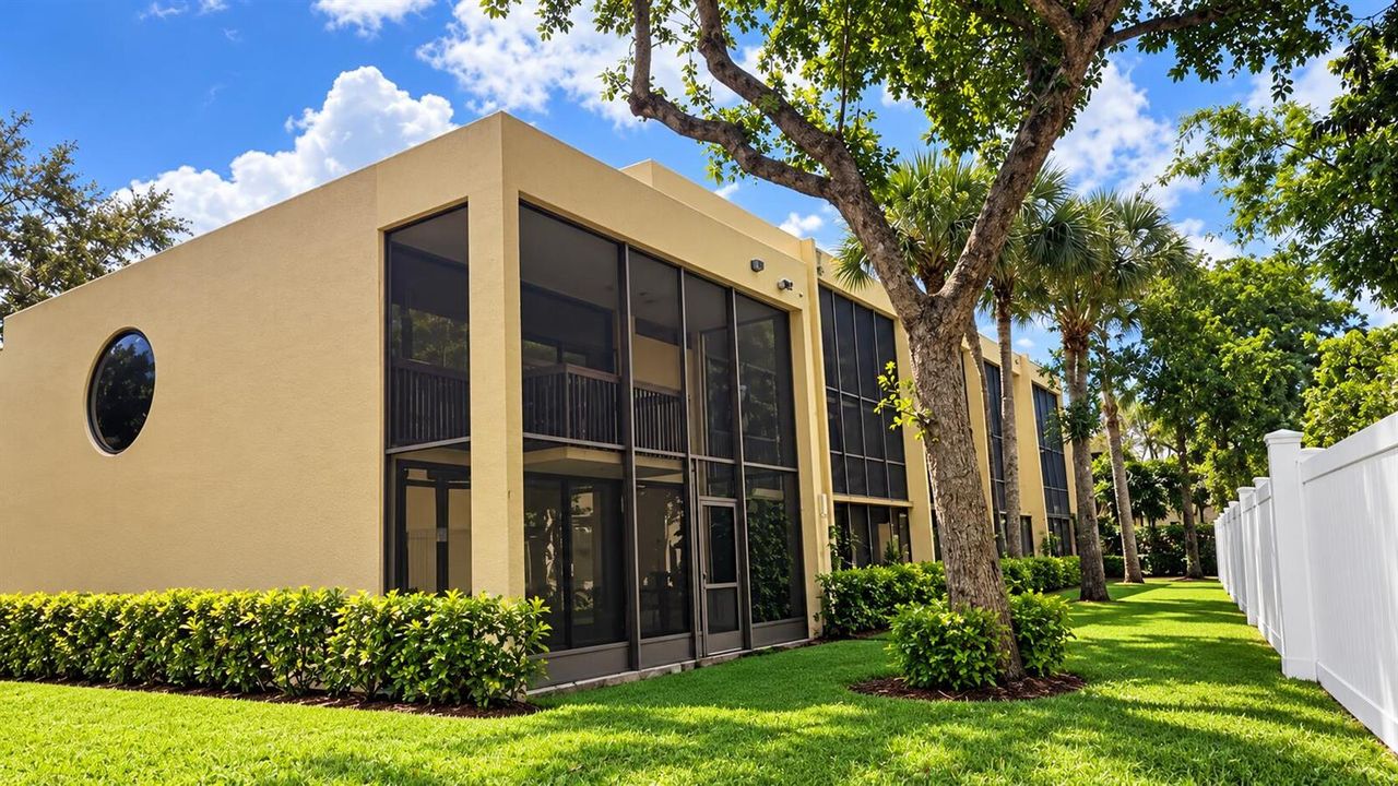 Modern Beige Condo with Tropical Landsca