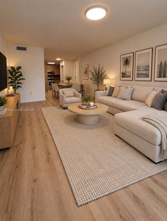 AI Open living area featuring wood-finish flooring, neutral wall tones, and recessed overhead lighting