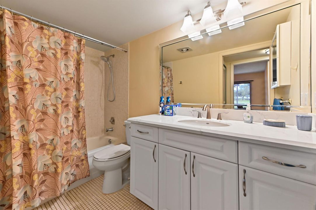 15 Bathroom with curtained tub