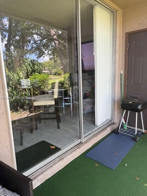 Sliding glass patio door with a metal frame and solid-core exterior door