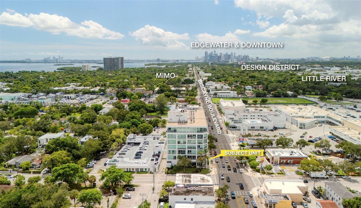 Aerial perspective of a multi-story building positioned along Biscayne Boulevard, featuring proximity to Edgewater, the Design District, and the urban core
