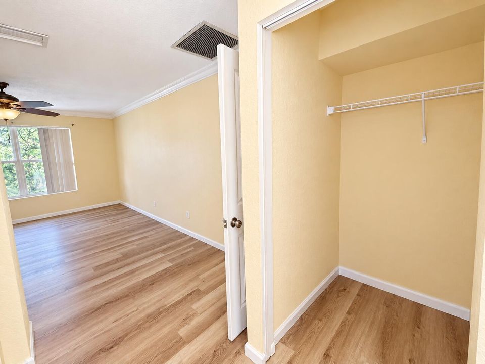 Bright Neutral Bedroom with Walk-In Clos