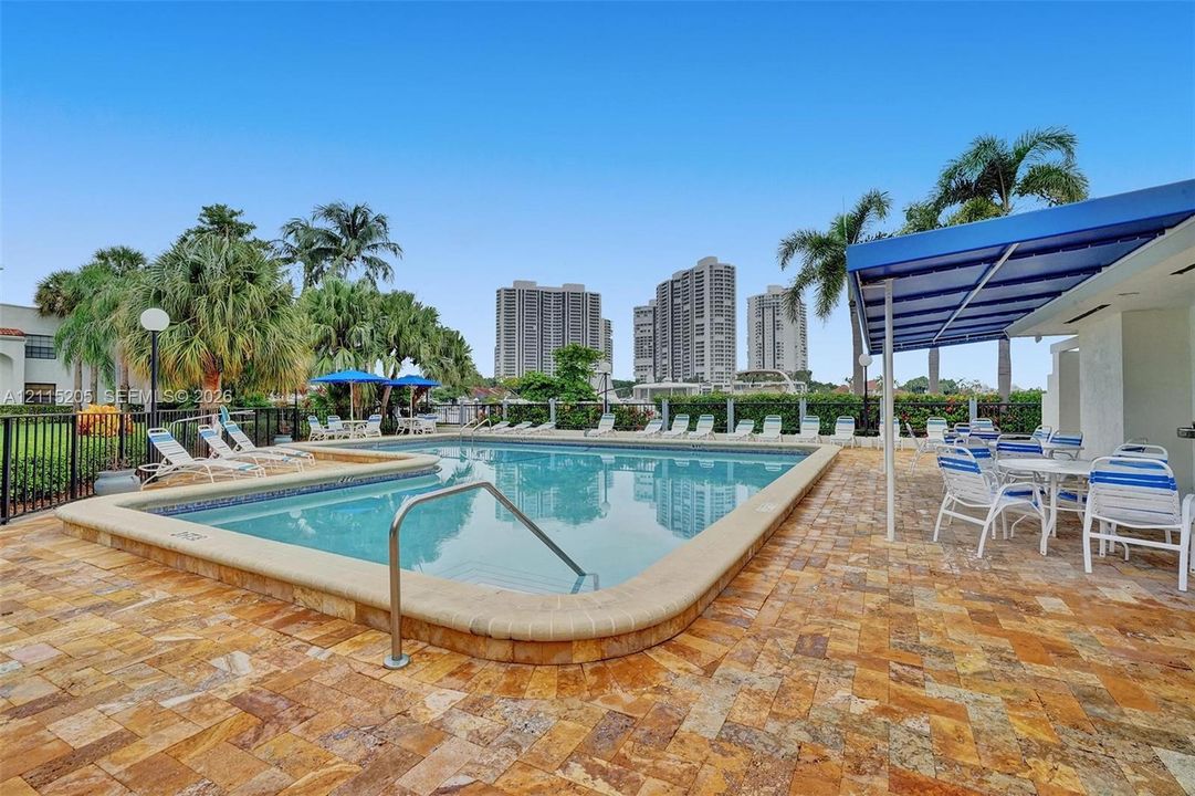 Heated community pool overlooking the Waterways marina.