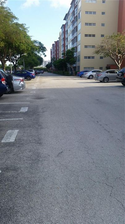 Dedicated surface parking area with marked stalls