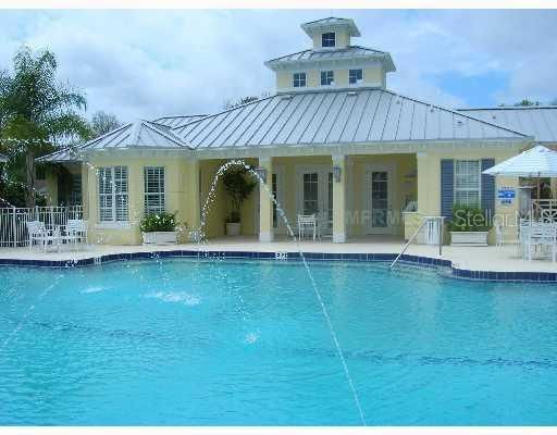 Swimming Pool/Hot Tub/Sauna - Heated community pool and hot tub. An outdoor kitchen w/ gas grill is also available.
