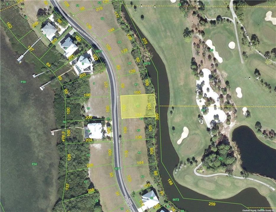 9980 Eagle Preserve Drive, Lot #2-46, is a 1/3 acre building lot with great views of the Lemon Bay Golf Course and a course pond.