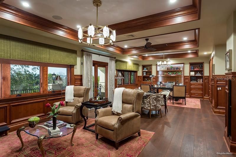 An executive study features extensive millwork
