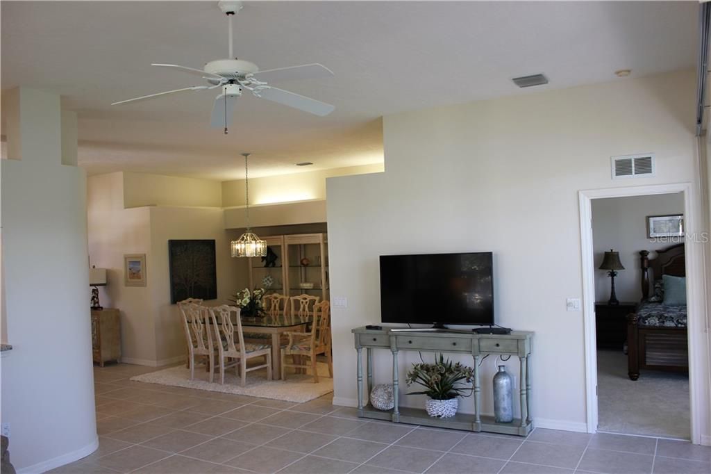 Looking from Main living area toward formal dining table.  Master bedroom on the right.....front door/foyer on left of the dining area.