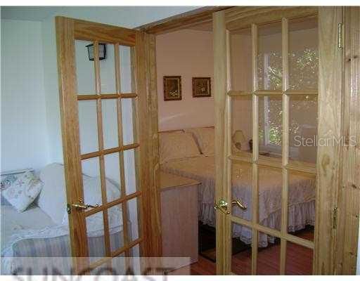 Exterior Front - Beautiful french doors from bedroom to sunroom