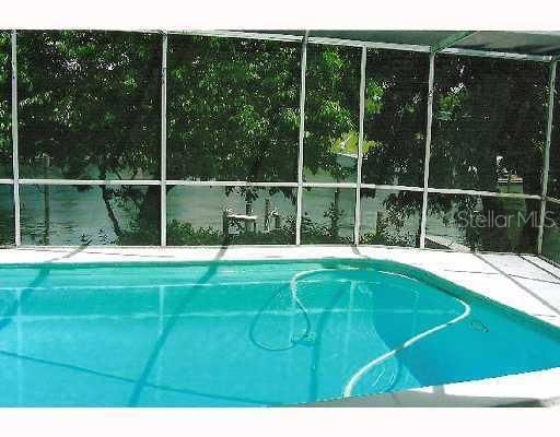 Swimming Pool/Hot Tub/Sauna - Jump in the pool after a day of boating or a visit to the beach. Beautiful view overlooking the Bayou from the comfort of your pool.