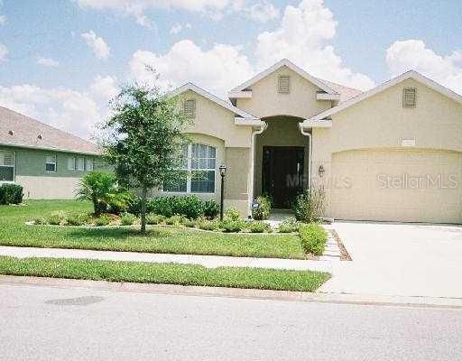 Exterior Front - Lovely 3/4 bedroom floor plan, on a lake and preserve!