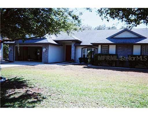 Exterior Front - gorgeous large lot and custom home  in Country Creek