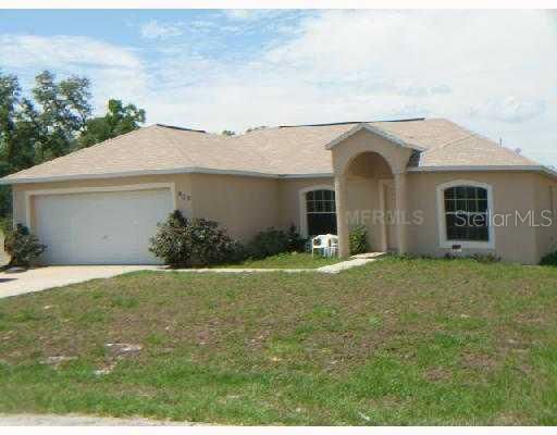 Exterior Front - 409 Rio Grande Ct Kissimmee   3/2 with 2 car garage