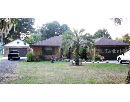 Exterior Front - Over a 1/3 of an ACRE ofland. 3 bedroom 2 Bath house with a split floor plan.  Fenced backyard  and double car garage. Close to town Available NOW.