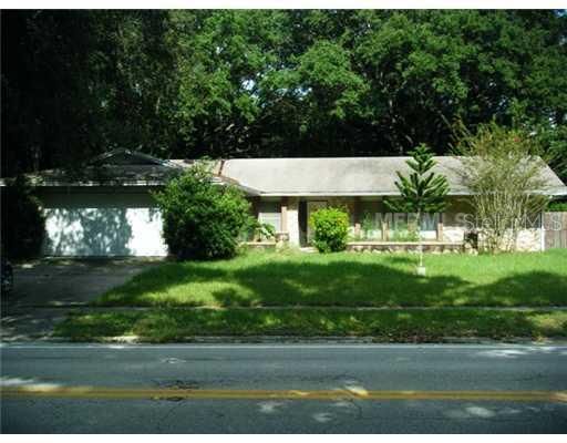 Exterior Front - Yard has since been mowed and hedges trimmed.  Looks GREAT!