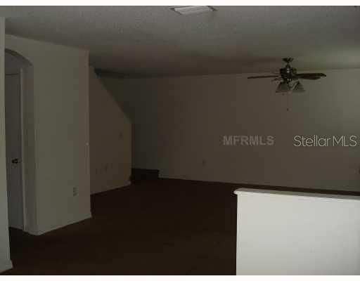 Den/Family/Great Room - Very spacious living/dining room with ceiling fan.  Plenty of windows and light.