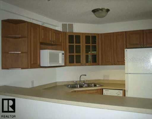 Exterior Front - Tastefully upgraded kitchen cabinets