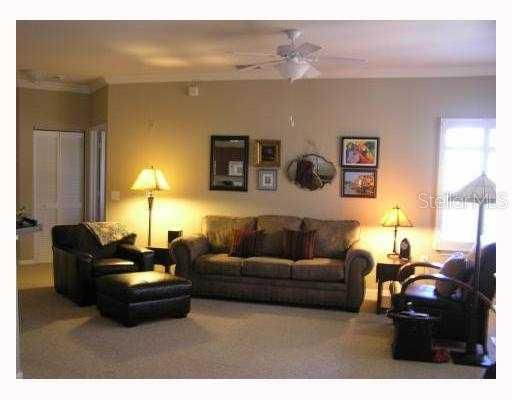 Exterior Front - Light & bright living room is picture perfect with upgraded crown moulding and Plantation shutters.