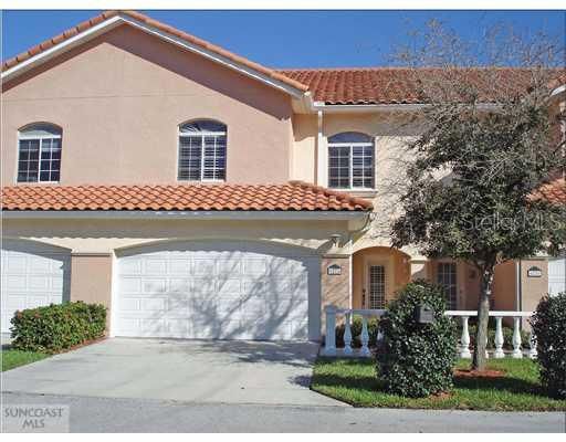 Exterior Front - This interior unit has a 2 car garage and covered entry for greeting your visitors.