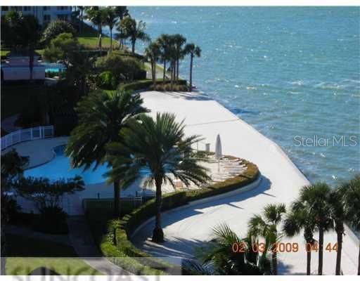 Exterior Front - Private beach surrounding the pool area