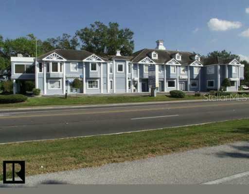 Exterior Front - View of building, suite in front lower level in front