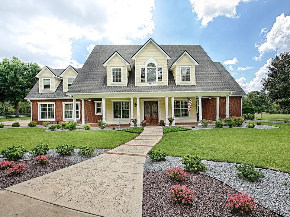 wonderful curb appeal with large covered front porch.