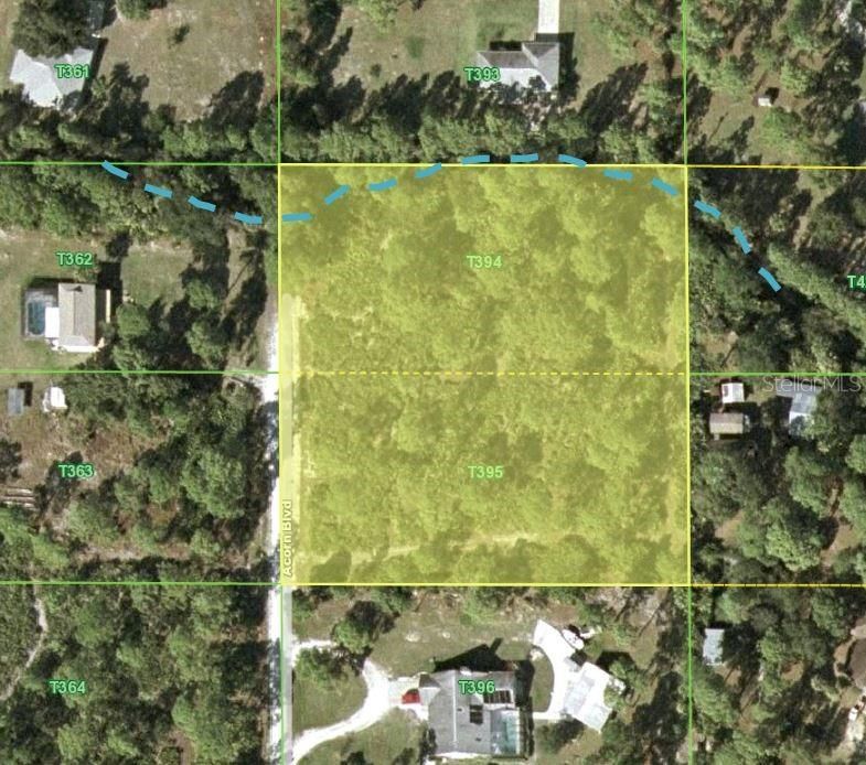 Aerial of property.  Blue line is an approximate estimate of the creek location all subject to a survey.  Consult a surveyor for creek boundaries.