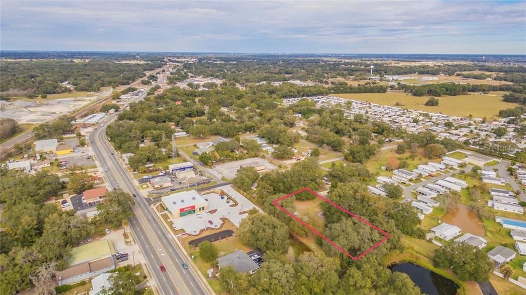 Arial view: You're looking at 300'+/- of road frontage.