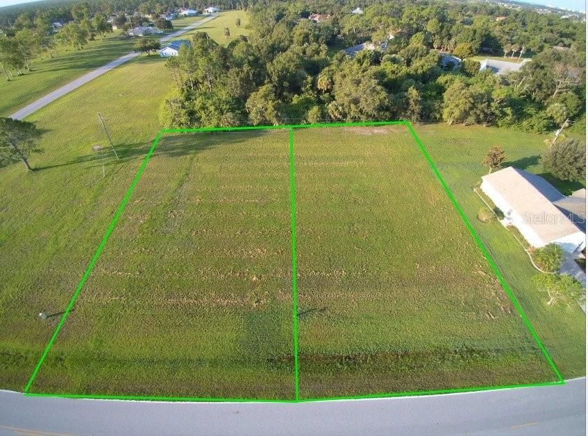 Two lots for one price. Southern exposure on your pool deck and a backdrop of woods for privacy.