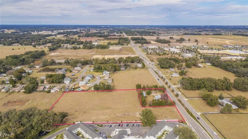 Arial view of the two parcels totaling 4.55+/- acres with 225+/- of road frontage and a 1,400+/- SQFT home.