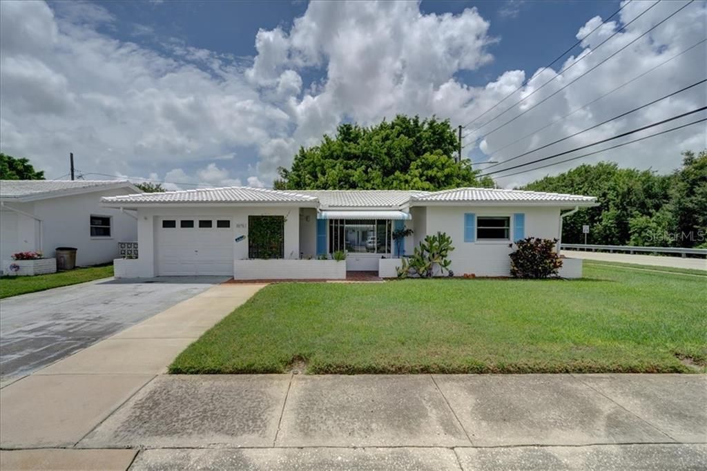Welcome home to 10170 42nd Way N!