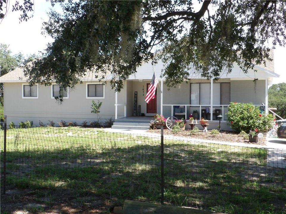 FRONT OF HOME WITH NICE FRONT PORCH
