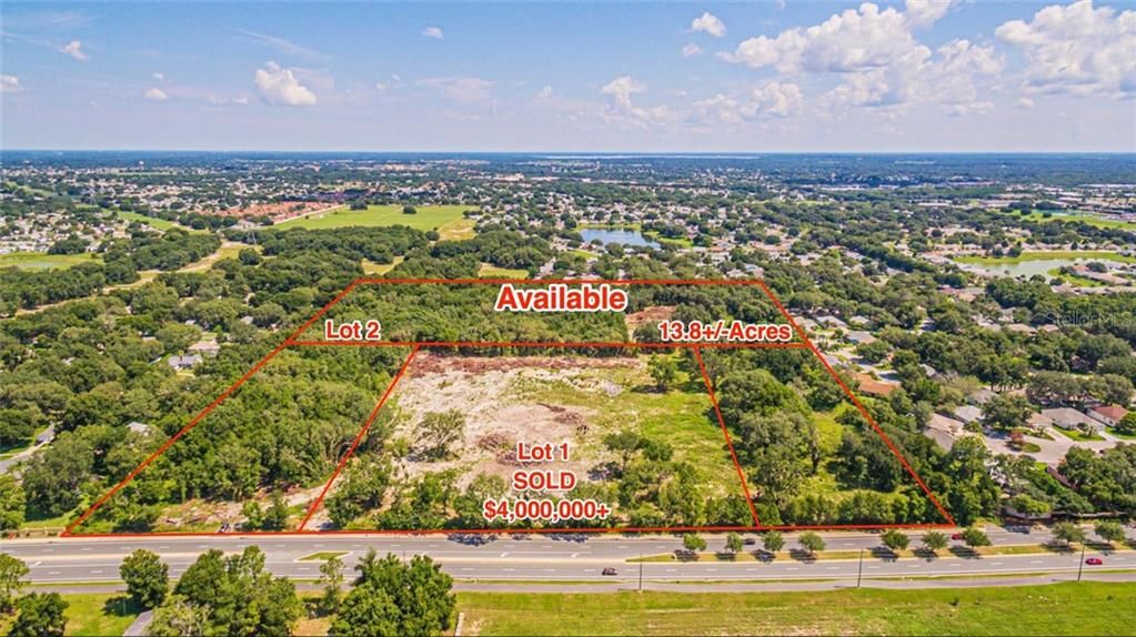 Arial view of 30+/- acres, with an ingress and egress from both east-and west-bound traffic on County Road 466.