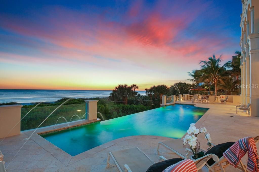 Infinity edge pool overlooking the Gulf of Mexico with sunset views 365 days a year