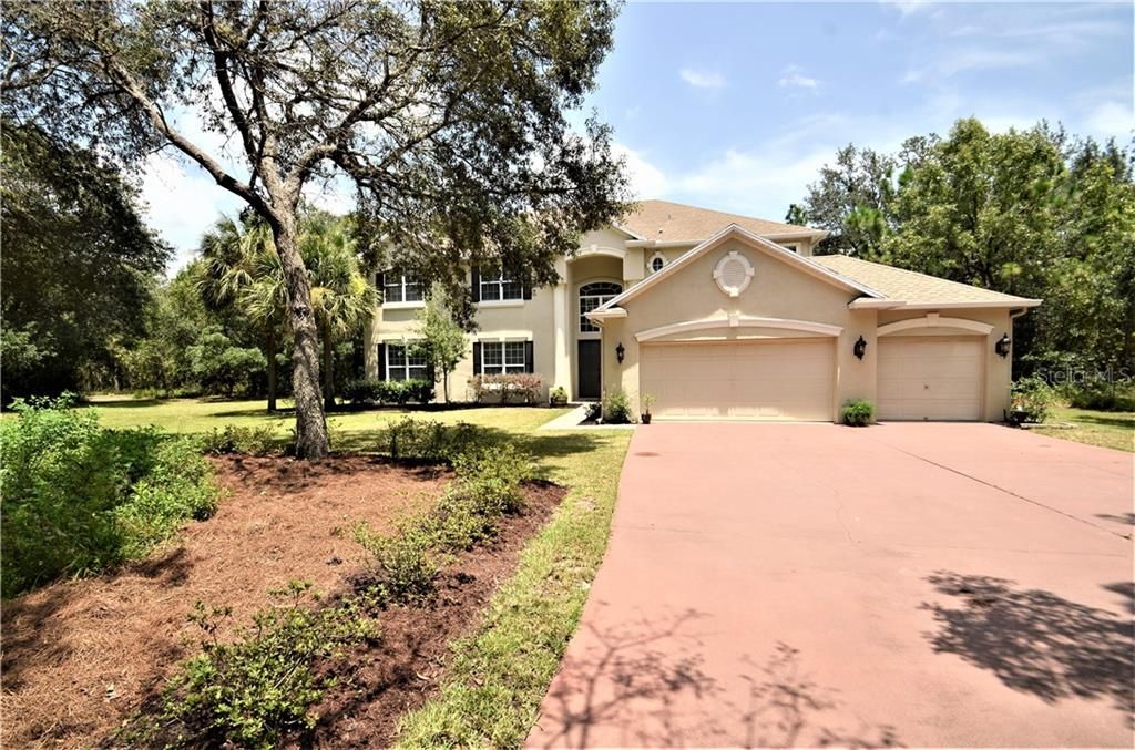 extensive native landscaping-easy to maintain-plenty of paved parking as well as additional cleared parking areas
