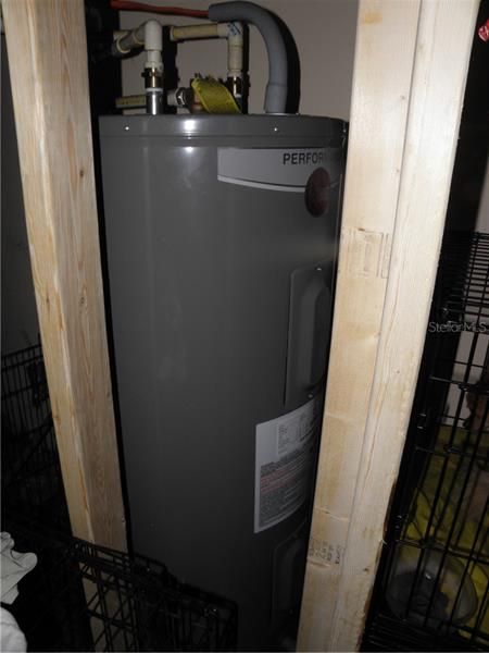 Over-sized Water heater is a 40 gal 4 years old. Take a shower and do the dishes at the same time and not worry about running out of hot water for a while.