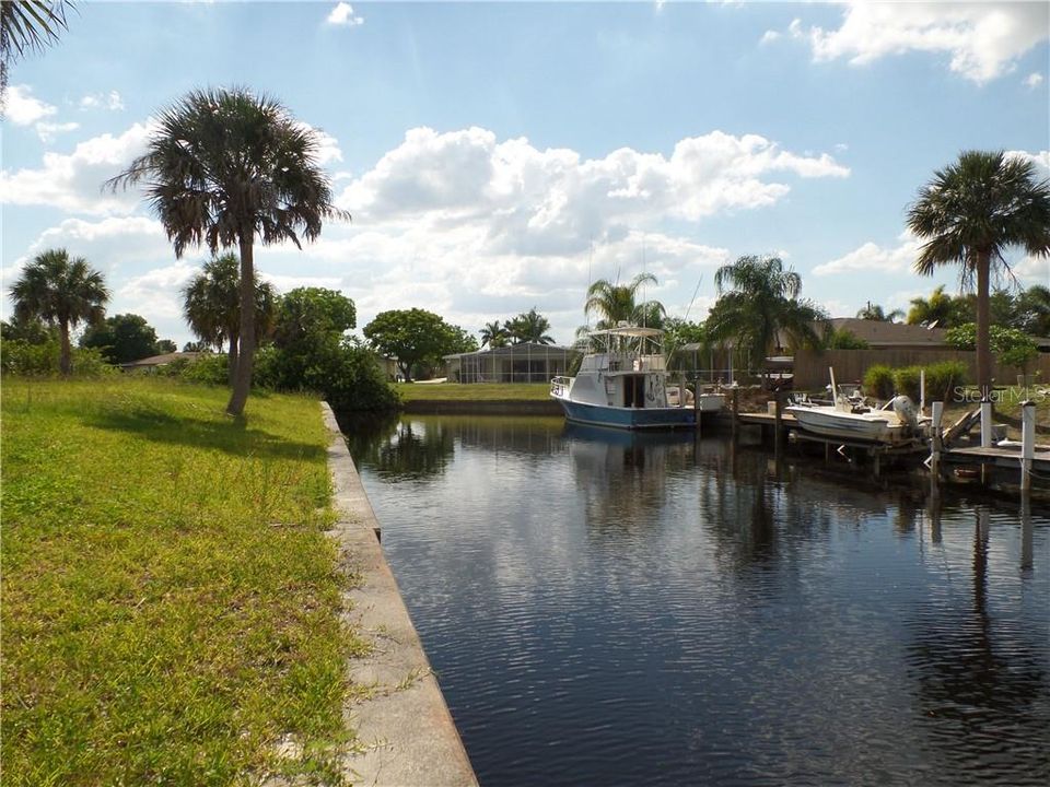 80 ft of concrete sea wall on very short boat ride to the Peace River and than onto the Charlotte Harbor & Gulf of Mexico!!