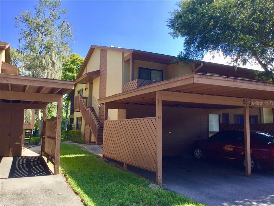 Covered parking with side entry to unit.