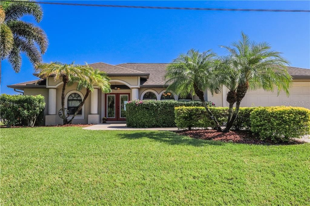 Front of house showing beautiful entry and landscaping
