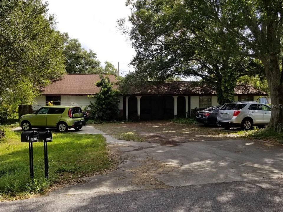 Duplex. Unit A on right, B on left. Parking pads for each unit (2 spaces each).