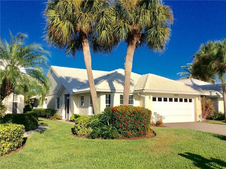 1839 Ashley Drive front of home looks to the West, home overlooks 2nd tee on golf course to the east.