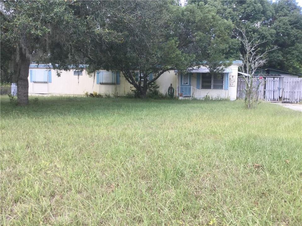 Single wide needs work but beautiful 1.55 Acre Lot