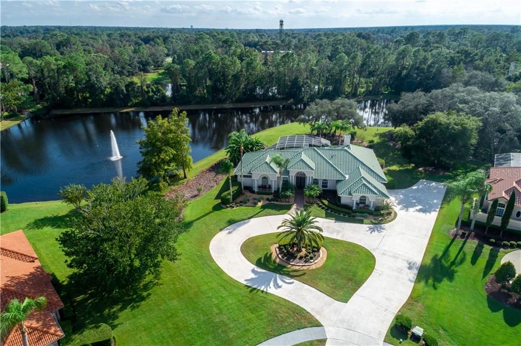 Welcome to Heathrow Woods, a split floor plan executive home which sits on over 1 acre at the end of a cul de sac. Watch the birds and wild life from almost every room!