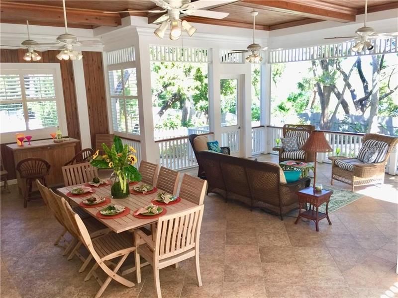 Large Screened Savannah Room With Views of the Bay and Lush Tropical Grounds.  Great for Entertaining.