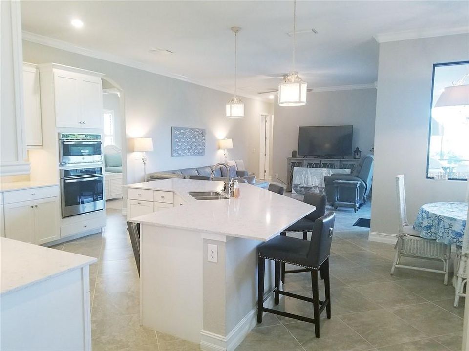 Kitchen and breakfast nook with family room